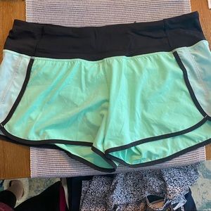 Lululemon Speed short in black/green/teal. Size 10
